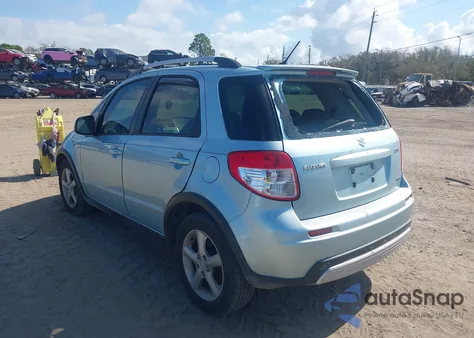 2009 Suzuki Sx4 Touring z USA, uszkodzony, nr VIN JS2YB417X95100760